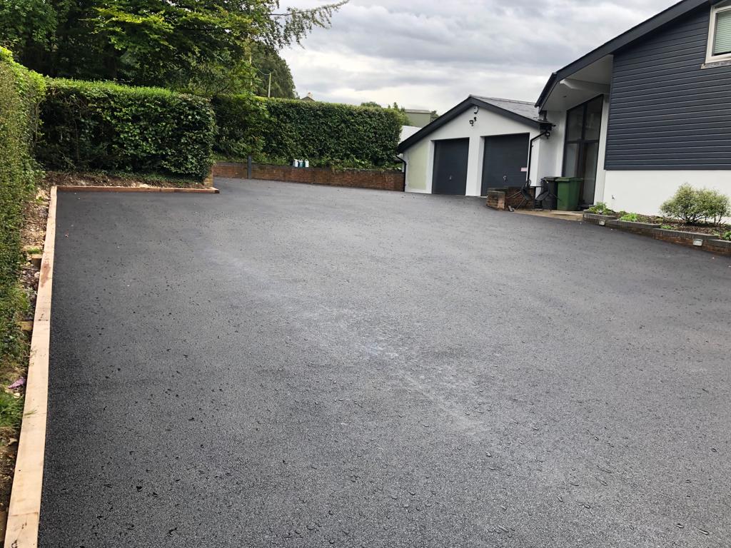 This is a photo of a asphalt driveway which is in the process of being installed by Cowra Road Tek